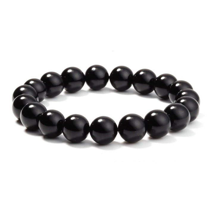 Black Onyx Bracelet - Balochistan LLC  Product information: Type: Bracelet Style: Women Modeling: geometric Health care function; resist fatigue Product name: black agate bracelet Product composition: black agate, imported elastic cord Bead size: 8MM Packing list: Bracelet*1