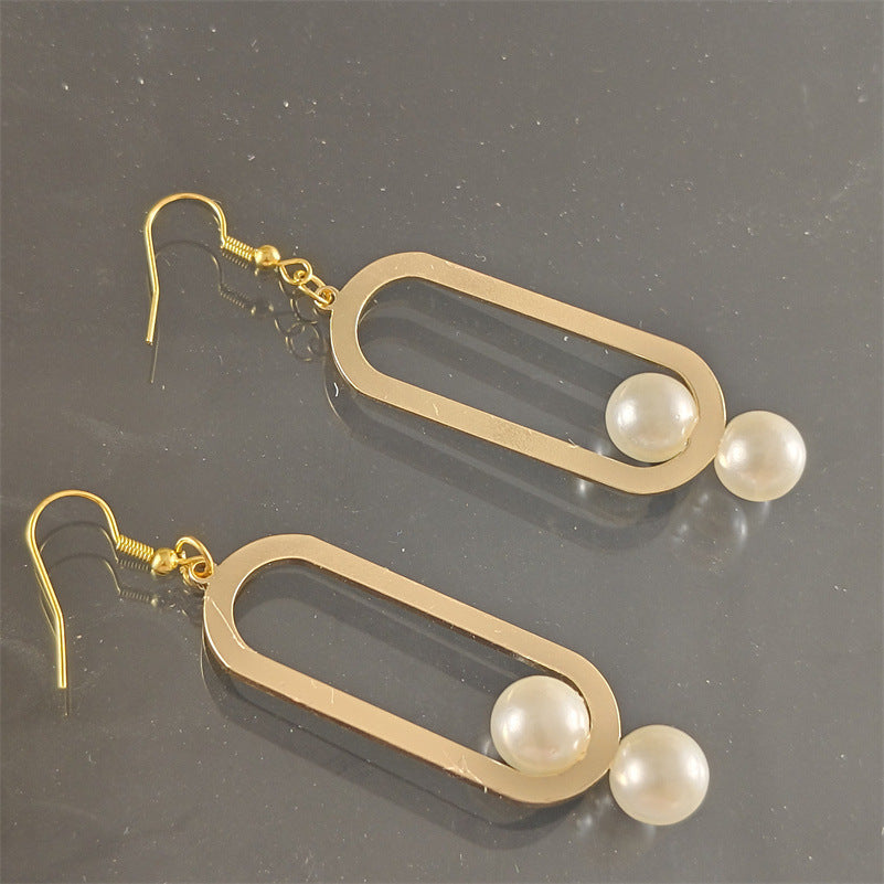 Elegant Fashion Metal Earrings Pearl Simple - Balochistan LLC  Product information: Treatment Process: Electroplating Color: gold pair Material: Alloy Shape: Geometry Style: fashion OL Packing list: Earrings x 1 pair Product Image: