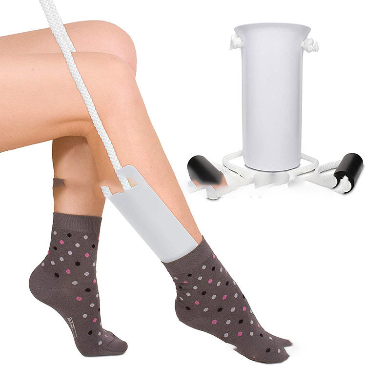 Cross-Border Products - Balochistan LLC  Product Information: Color: white + black handle Material: Plastic PP+EVA handle Selling point: help wear socks, wear elastic stockings and not change shape