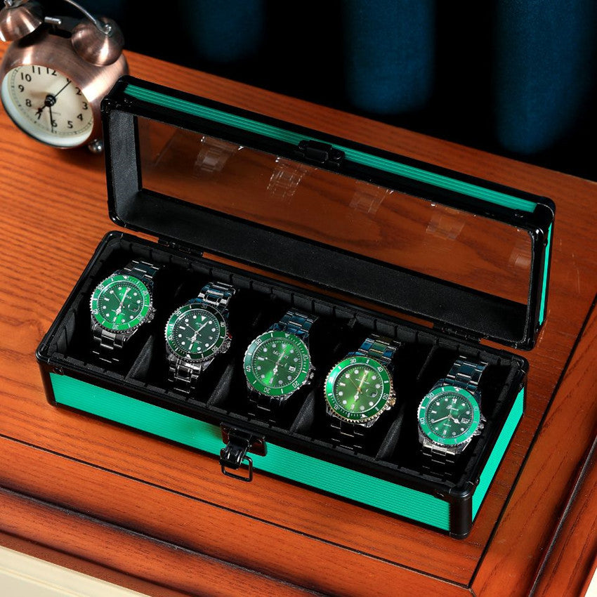 Green Aluminum Alloy 5 Grid Top Cover Transparent Watch Storage Box - Balochistan LLC  Product information: Product size: 290x110x85mm Color: green Material: aluminum alloy Product description: Rounded corners, upper cover glass, can hold five watches, the partition inside can be moved at will, and other storage items can be placed Packing list: Storage Box*1