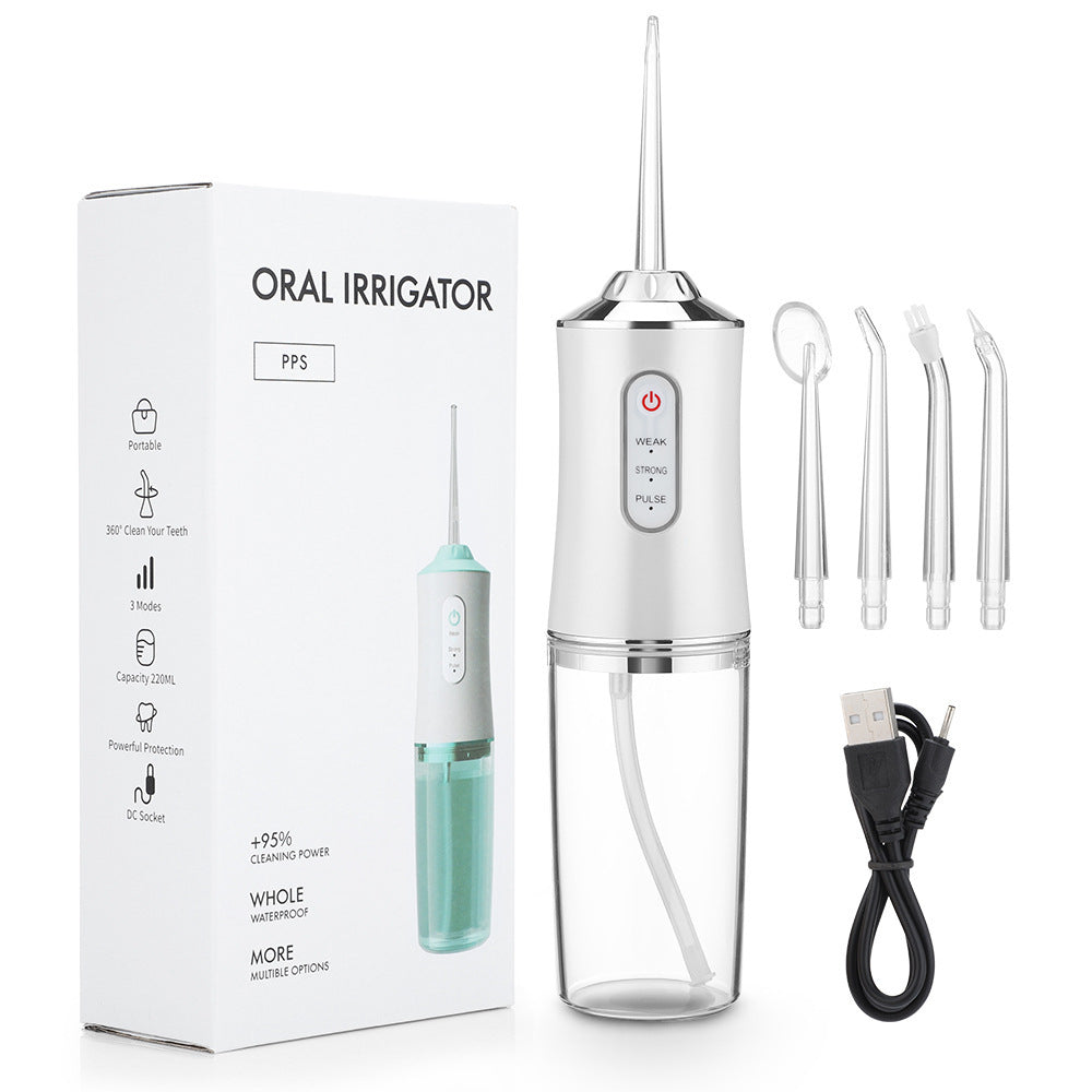 Household 3-speed 220ml Hand-held Electric Dental Irrigator - Balochistan LLC  Product information: Power Mode: Electric Color: white, pink, light green black Material: ABS Rated voltage: DC3.7V Rated power: 3.5W Battery capacity: 1200mA Host size: 21*5.8cm Packing list: Host*1, replacement nozzle*4, USB charging cable*1, English manual*1. English color box*1