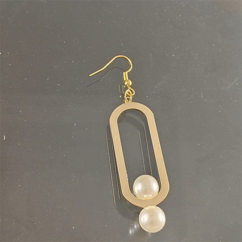 Elegant Fashion Metal Earrings Pearl Simple - Balochistan LLC  Product information: Treatment Process: Electroplating Color: gold pair Material: Alloy Shape: Geometry Style: fashion OL Packing list: Earrings x 1 pair Product Image: