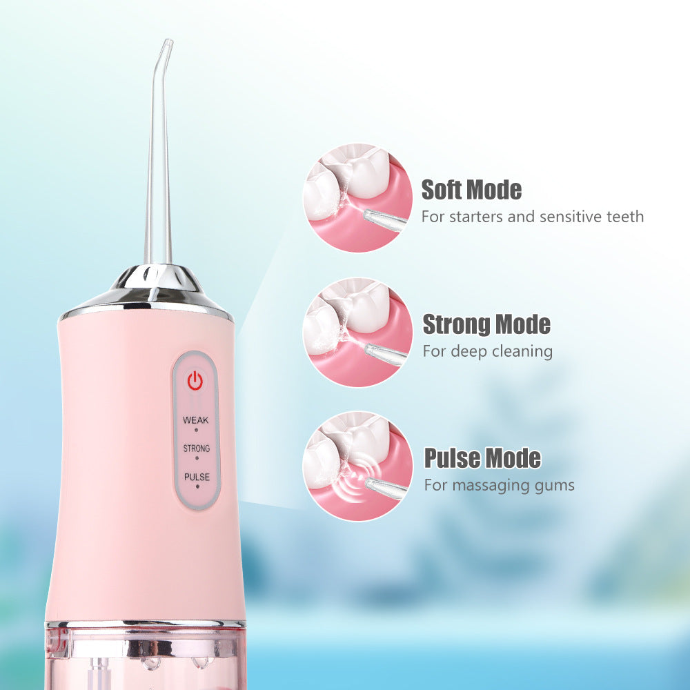 Household 3-speed 220ml Hand-held Electric Dental Irrigator - Balochistan LLC  Product information: Power Mode: Electric Color: white, pink, light green black Material: ABS Rated voltage: DC3.7V Rated power: 3.5W Battery capacity: 1200mA Host size: 21*5.8cm Packing list: Host*1, replacement nozzle*4, USB charging cable*1, English manual*1. English color box*1