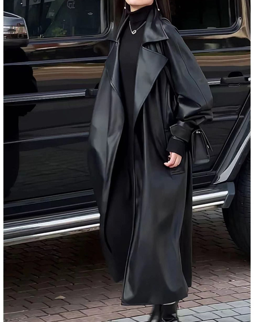 Women's Fashion Temperament Long Below The Knee Leather Coat - Balochistan LLC  Product information: Color: Black Size: S [40.00kg-57.50kg],M [57.50kg-70.00kg],L [70.00kg-80.00kg],XL [80.00kg-92.50kg]] With fur collar or not: no fur collar Leather classification: Leather Fabric name: artificial fur Main fabric composition: pu Applicable Gender: Female Style: British style Packing list: Leather Coat*1 Product Image: