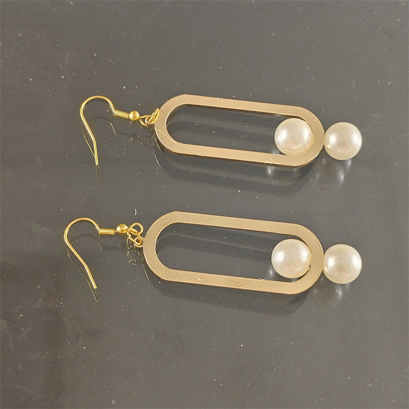 Elegant Fashion Metal Earrings Pearl Simple - Balochistan LLC  Product information: Treatment Process: Electroplating Color: gold pair Material: Alloy Shape: Geometry Style: fashion OL Packing list: Earrings x 1 pair Product Image: